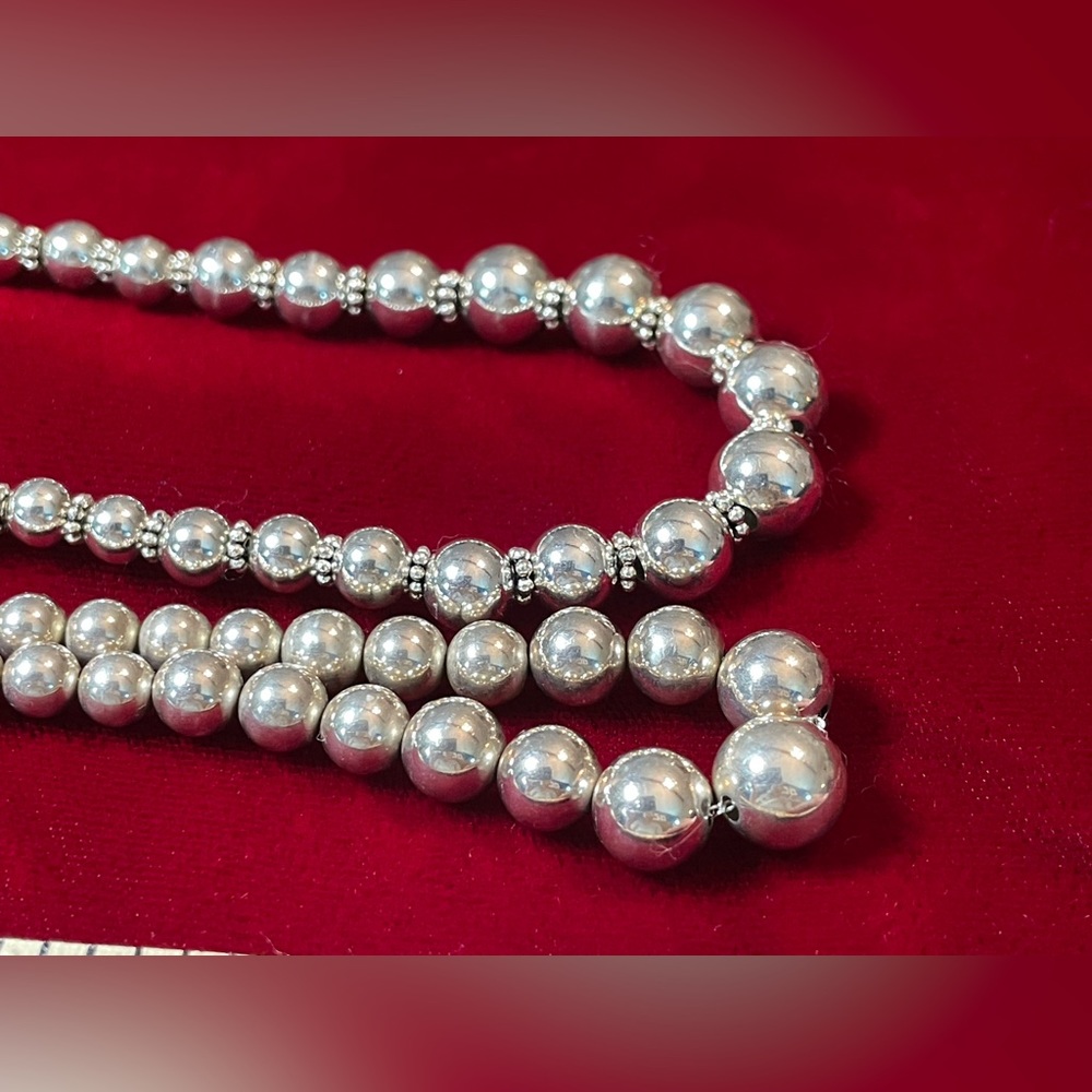 Two Silver Graduated Bead Necklaces 9 inch drop/18 inch from clasp to eye.